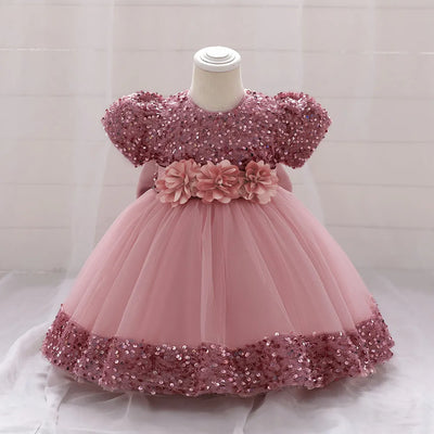 Robe princesse bébé rose à sequins et tulle avec ceinture fleurs