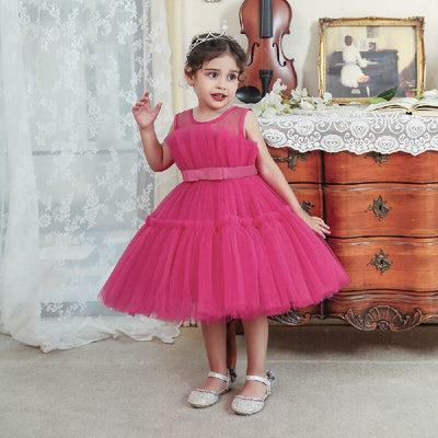 Robe princesse fille rose vif avec corsage à plis et ruban à la taille