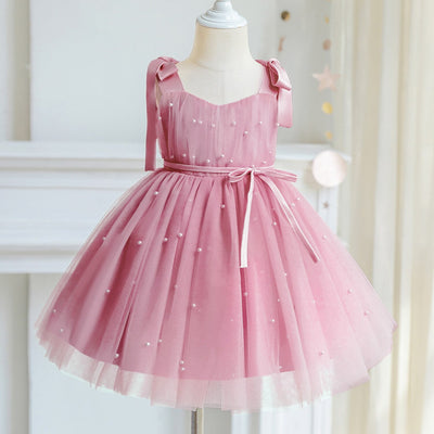 Robe cérémonie fille pastel avec détails perlés et nœuds