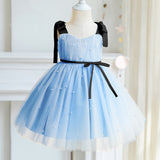 Robe cérémonie fille pastel avec détails perlés et nœuds