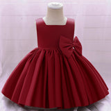 Robe cérémonie fille crème sans manches avec grand noeud et jupe évasée