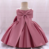 Robe cérémonie fille crème sans manches avec grand noeud et jupe évasée