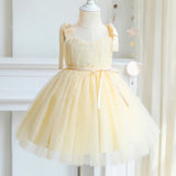 Robe cérémonie fille pastel avec détails perlés et nœuds