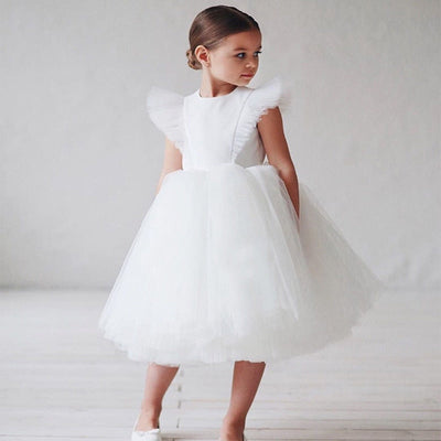 Robe princesse fille blanche avec jupon volumineux en tulle et manches à volants
