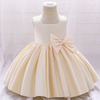 Robe cérémonie fille crème sans manches avec grand noeud et jupe évasée