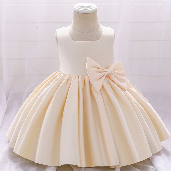 Robe cérémonie fille crème sans manches avec grand noeud et jupe évasée