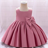 Robe cérémonie fille crème sans manches avec grand noeud et jupe évasée