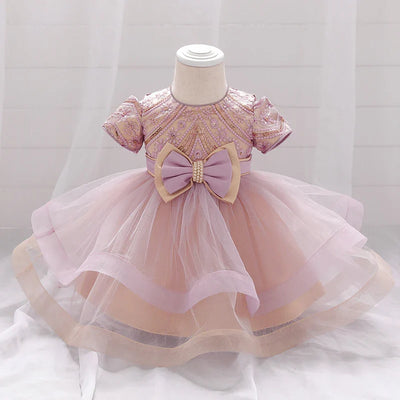 Robe princesse bébé rouge foncé avec motifs floraux et nœud crème
