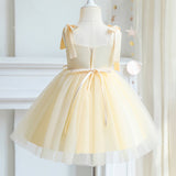 Robe cérémonie fille pastel avec détails perlés et nœuds