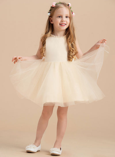 Robe cérémonie fille crème avec perles et jupe en tulle