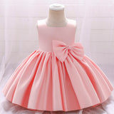 Robe cérémonie fille crème sans manches avec grand noeud et jupe évasée