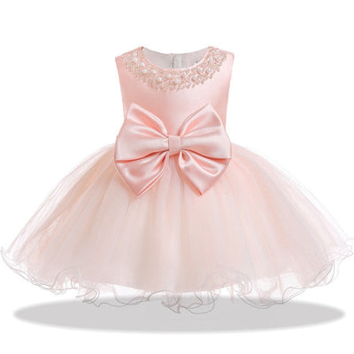 Robe princesse bébé rose pâle avec grand nœud en satin