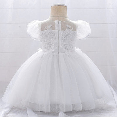 Robe baptême bébé fille blanche avec manches bouffantes et broderies florales