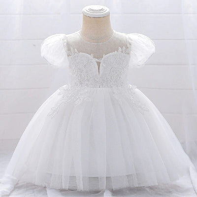 Robe baptême bébé fille blanche avec manches bouffantes et broderies florales