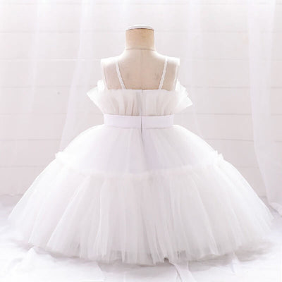 Robe princesse fille rose vif avec corsage à plis et ruban à la taille
