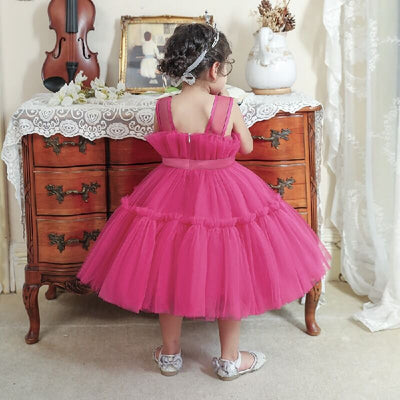 Robe princesse fille rose vif avec corsage à plis et ruban à la taille