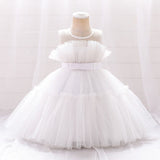 Robe princesse fille rose vif avec corsage à plis et ruban à la taille
