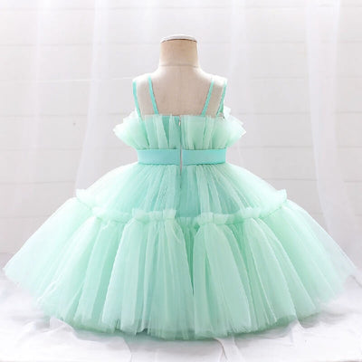 Robe princesse fille rose vif avec corsage à plis et ruban à la taille