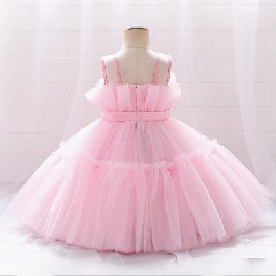 Robe princesse fille rose vif avec corsage à plis et ruban à la taille