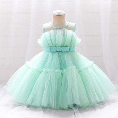 Robe princesse fille rose vif avec corsage à plis et ruban à la taille