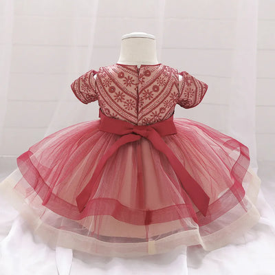 Robe princesse bébé rouge foncé avec motifs floraux et nœud crème