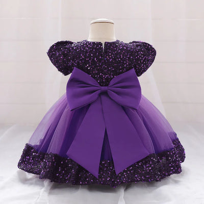 Robe princesse bébé rose à sequins et tulle avec ceinture fleurs