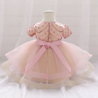 Robe princesse bébé rouge foncé avec motifs floraux et nœud crème