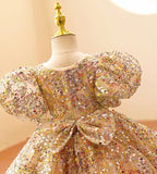 Robe princesse fille champagne à paillettes multicolores avec manches bouffantes et grand nœud