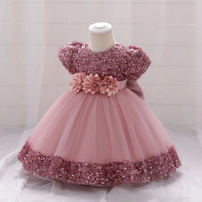 Robe princesse bébé rose à sequins et tulle avec ceinture fleurs