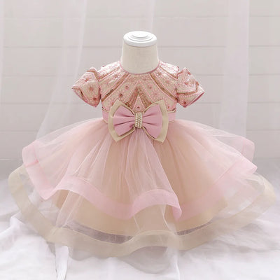 Robe princesse bébé rouge foncé avec motifs floraux et nœud crème