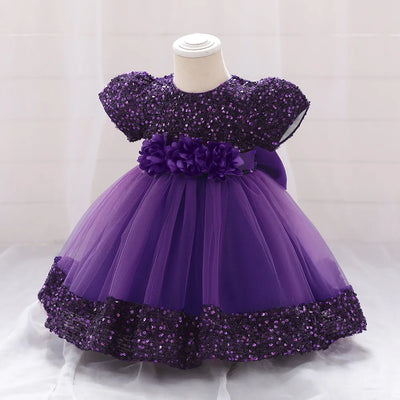 Robe princesse bébé rose à sequins et tulle avec ceinture fleurs