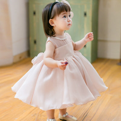 Robe cérémonie fille rose pâle col perles nœud arrière