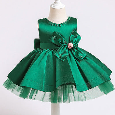 Robe princesse bébé rose avec nœud décoratif et perles