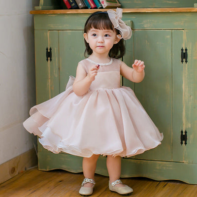 Robe cérémonie fille rose pâle col perles nœud arrière