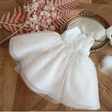Robe cérémonie fille blanche à paillettes et appliqués floraux en tulle volumineux