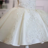 Robe cérémonie fille ivoire broderies florales élégantes