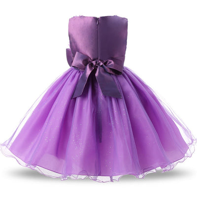 Robe princesse bébé violet motif floral avec nœud en satin et jupe en tulle scintillante