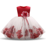 Robe princesse bébé rouge bordeaux avec jupe en tulle blanc et pétales rouges