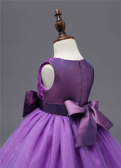 Robe princesse bébé violet motif floral avec nœud en satin et jupe en tulle scintillante