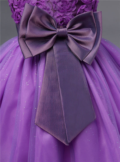 Robe princesse bébé violet motif floral avec nœud en satin et jupe en tulle scintillante