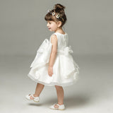 Robe cérémonie fille blanche avec fleurs en tissu et jupe évasée