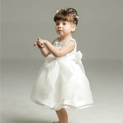 Robe baptême bébé fille blanche avec nœud et col décoré