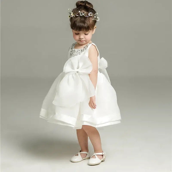 Robe baptême bébé fille blanche avec nœud et col décoré