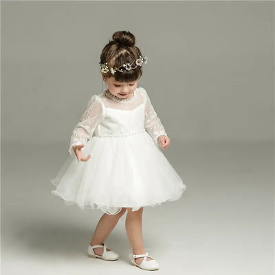 Robe baptême bébé fille blanche avec dentelle et perles