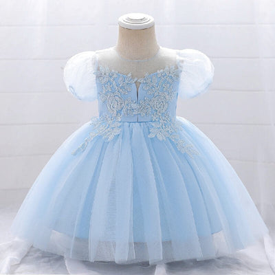 Robe baptême bébé fille blanche avec manches bouffantes et broderies florales