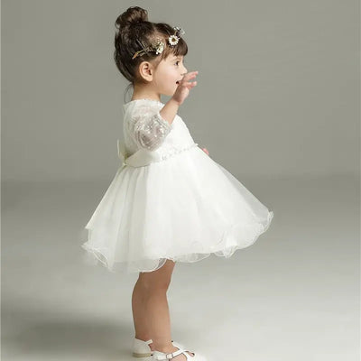 Robe baptême bébé fille blanche avec dentelle et perles