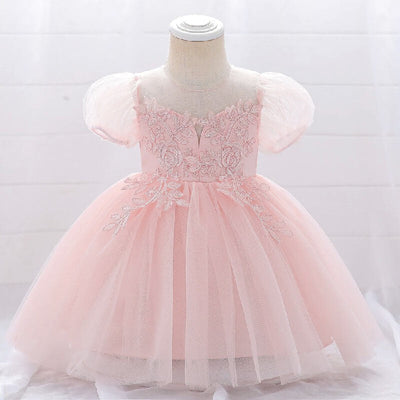 Robe baptême bébé fille blanche avec manches bouffantes et broderies florales