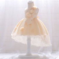 Robe princesse bébé crème avec fleurs en relief et nœud à l'avant
