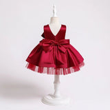 Robe princesse bébé rose avec nœud décoratif et perles