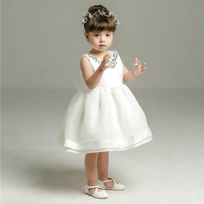 Robe baptême bébé fille blanche avec nœud et col décoré